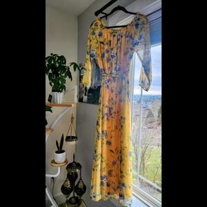 Like New Yellow Maxi dress with a slit, size 4 sheer sleeves